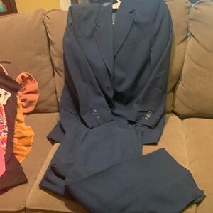 Dressy pant suit.  Very professional attire.  Jacket with slacks